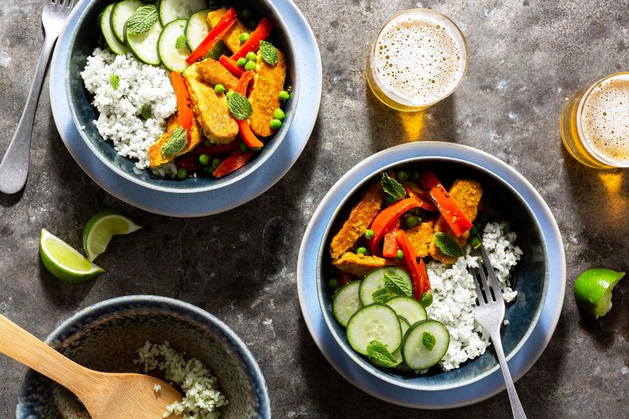 Madras curry bowls with steamed rice, crispy tempeh, and cucumber