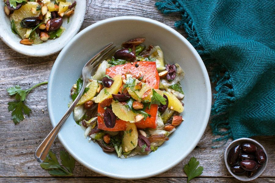 Salmon with escarole, dates, and orange-almond relish