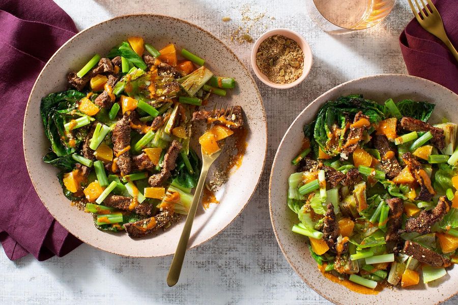 Seared romaine with your choice of protein, orange, and pumpkin seeds