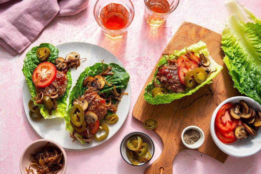 Lettuce-wrapped “sliders” with BBQ glaze and caramelized onions