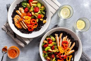 Chicken Buddha bowls with black rice and chipotle mustard vinaigrette