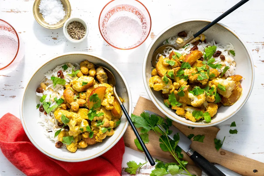 North Indian aloo gobi with potatoes and cauliflower over basmati rice