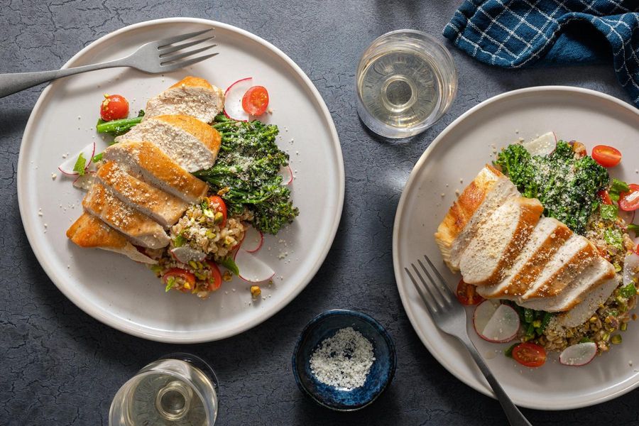 Pan-cooked chicken with baby broccoli and warm Tuscan farro salad