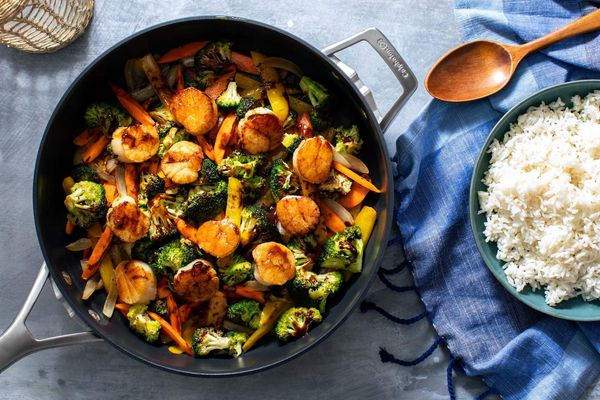 Hot and sour chicken stir-fry with vegetables and long-grain rice