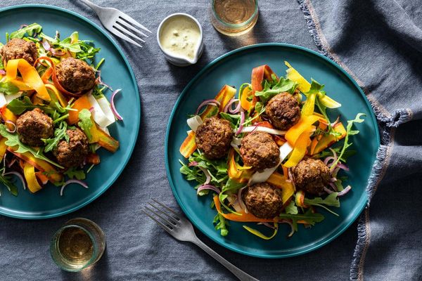 Chicken meatballs with caramelized onions and carrot-parsnip salad