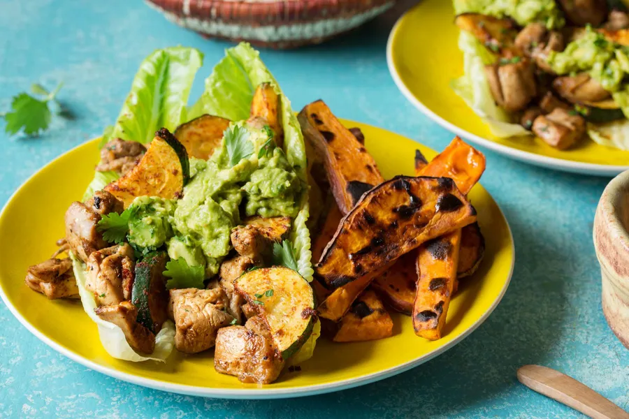 Cuban chicken and zucchini lettuce wraps with sweet potato fries