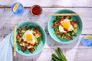 Ginger-fried brown rice with bok choy, bell pepper, and runny eggs