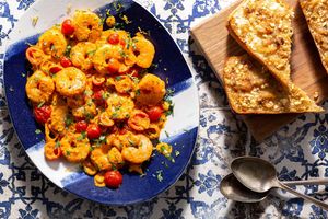 Greek shrimp with red pepper romesco and garlic-feta toasts