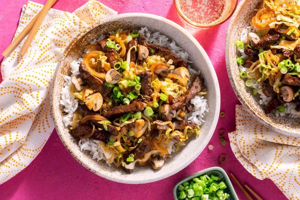 Five-spice pork stir-fry with cabbage and mushrooms over jasmine rice