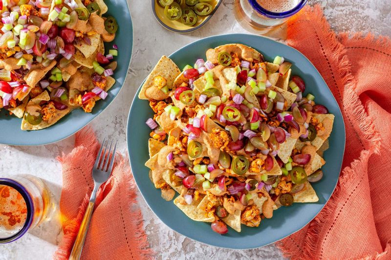 Smoky Tempeh Nachos with CucumberGrape Salsa and ChipotleCashew Sauce
