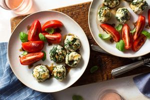 Spinach and ricotta gnudi in porcini brown butter with tomato salad
