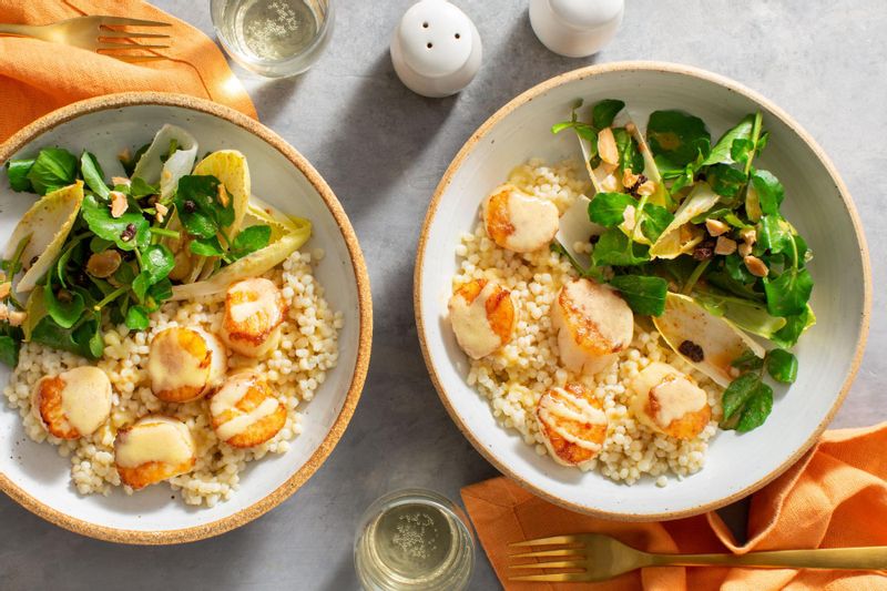 Wild Sea Scallops Over Couscous with Citrus Beurre Blanc and Endive Salad | Sunbasket