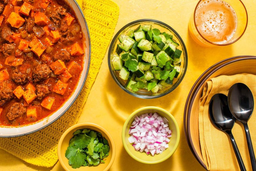 Chipotle chili with sweet potato and sumac-cucumber salad