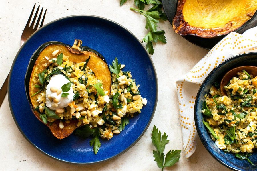 Bulgur-stuffed acorn squash with feta and spinach