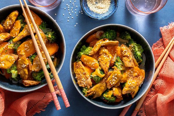 Steak stir-fry with broccoli, carrots, and sesame seeds