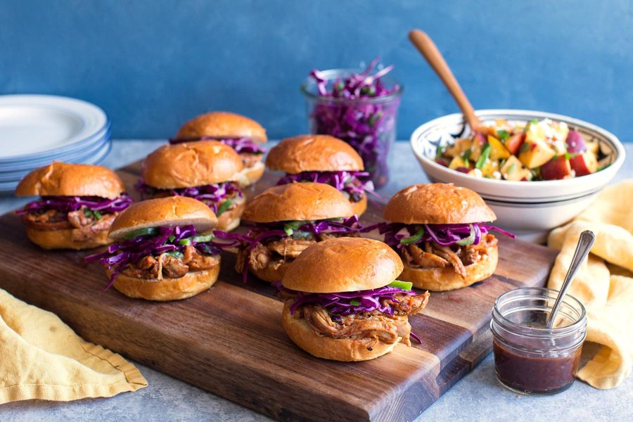 BBQ pulled chicken sliders with peach-feta salad and cabbage slaw