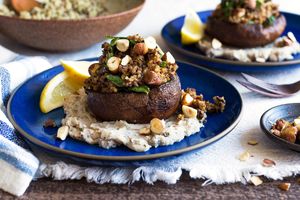 Spinach and quinoa-stuffed portobellos with white bean mash