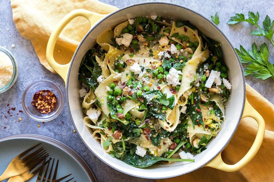 Fresh pappardelle with peas, hazelnuts, and ricotta salata