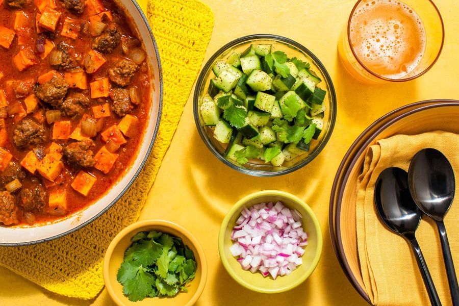 Chipotle chili with sweet potato and sumac-cucumber salad