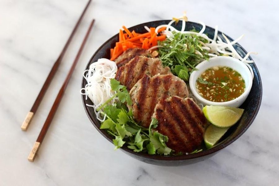 Vietnamese noodles with lemongrass pork patties, mint and lime