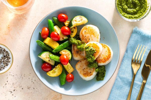 Seared salmon with chimichurri and Provençal vegetables