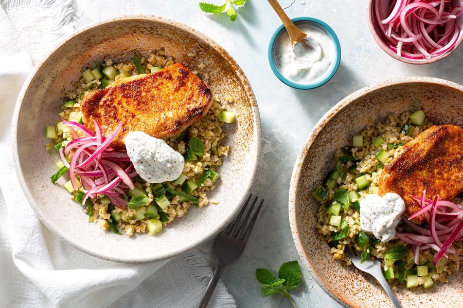 Harissa-rubbed pork with freekeh, pickled onion, and lemon-dill yogurt