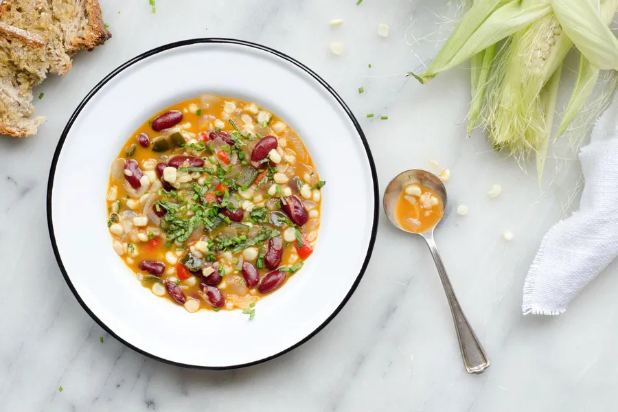 Sweet corn and coconut chowder with roasted red pepper and poblano