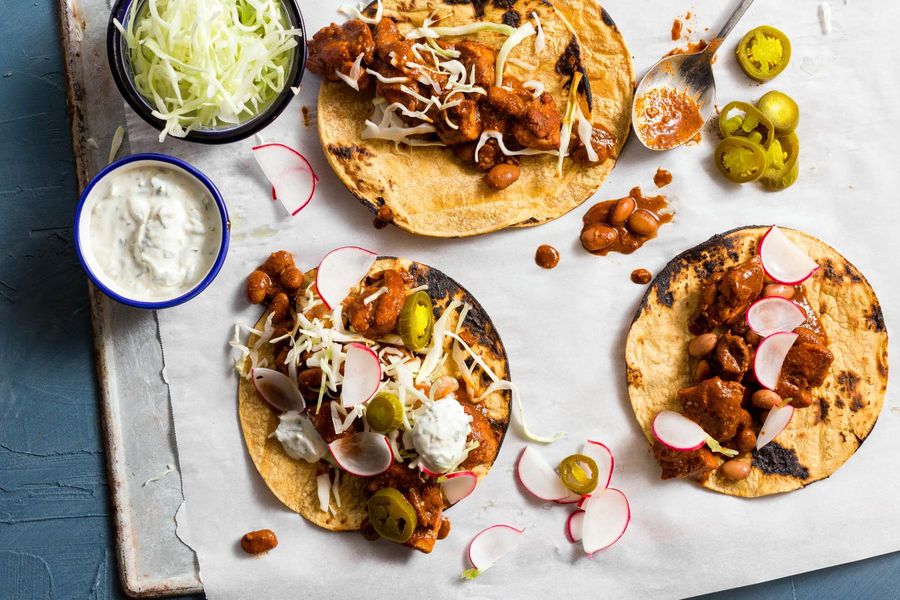 Chicken mole poblano tacos with cilantro-lime yogurt