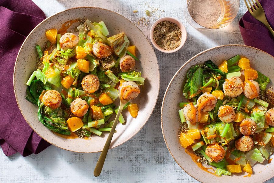 Seared romaine with your choice of protein, orange, and pumpkin seeds