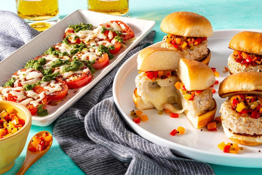 Juicy Lucy sliders with peperonata relish and warm caprese salad