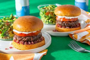 Wagyu burgers with pancetta-onion jam and asparagus-couscous salad