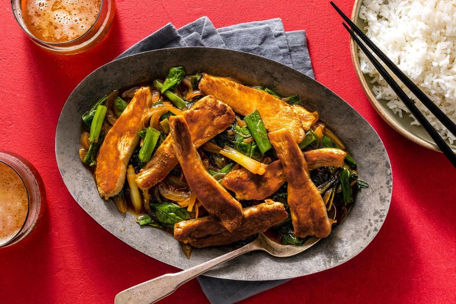 Mongolian stir-fry with spinach and scallions over steamed rice