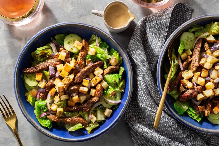 Beef shawarma salad with roasted potato and lemon-tahini dressing