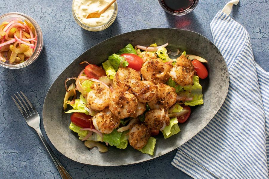 A salad inspired by a pastrami sandwich with your choice of protein