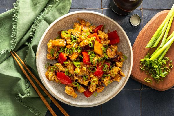 Five-spice pork and eggplant stir-fry with cashew-plum sauce