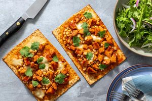 BBQ chicken, corn, and fresh mozzarella pizzas with arugula salad