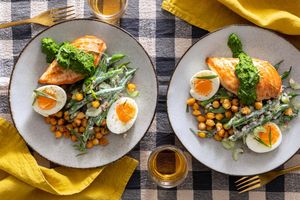 Chicken breasts over crispy chickpeas with green bean salad and pesto
