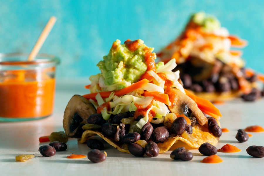 Black bean tostadas diablo with cabbage slaw and guacamole