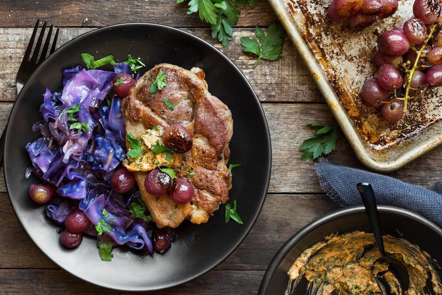 Pork blade steaks with red cabbage and roasted grapes