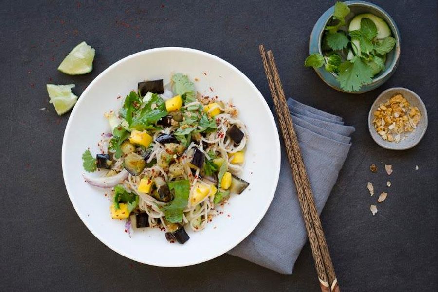 Soba noodle salad with charred eggplant, mango and fresh herbs