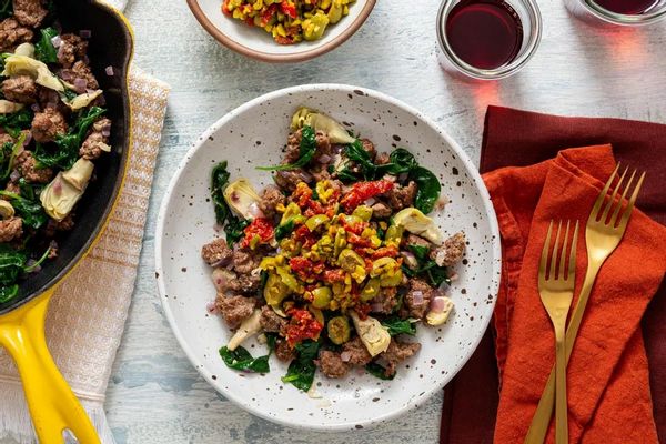 Mediterranean turkey and spinach skillet with sun-dried tomato tapenade