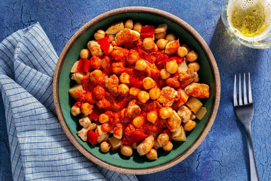 Spiced chicken, potatoes, and chickpeas in Hungarian red pepper sauce