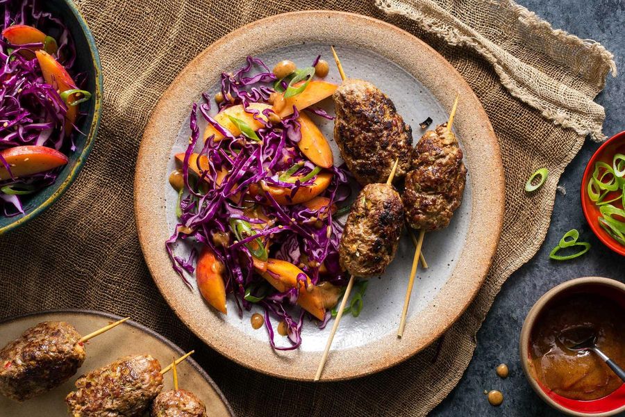 Korean skewers with your choice of protein and sesame-cabbage slaw