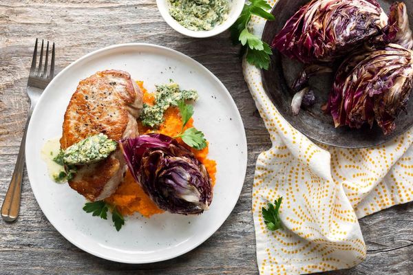 Seared boneless pork chops with chermoula butter