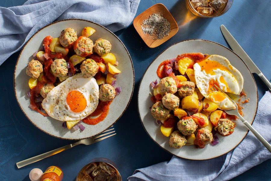 Turkey and zucchini meatballs with roasted potatoes and fried eggs