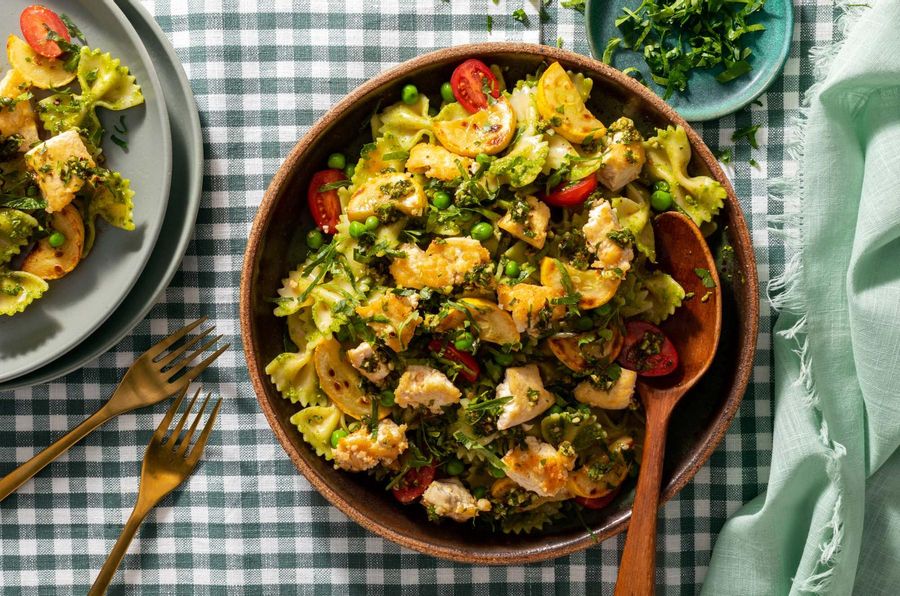 Farfalle with your choice of protein and arugula-pistachio pesto