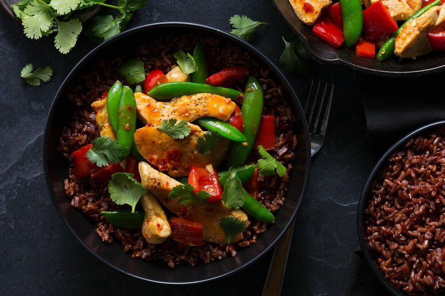 Ginger-sesame chicken with sugar snap peas and red rice