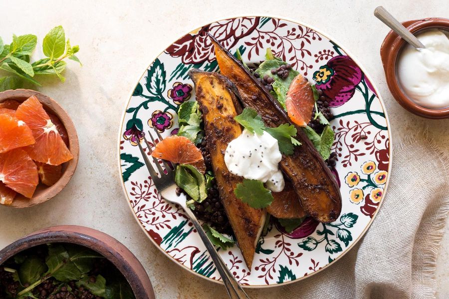 Black lentil, orange, and kale salad with pomegranate-glazed eggplant