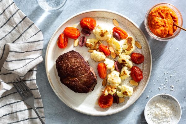Seared steaks with roasted red pepper ajvar and cauliflower