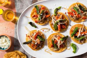 Yucatán chicken tostadas with charred shishito peppers and refried beans